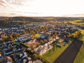 A vast village in an autumnal landscape with fields, Aidlingen, Böblingen district, Germany