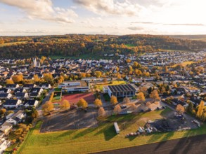 Village in a natural autumn landscape with warm colors, Aidlingen, Böblingen district, Germany