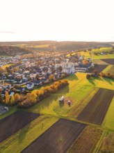 Bird's eye view of settlement and fields, autumn colors in evening light, Aidlingen, Böblingen