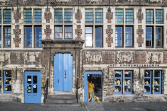Façade of 17th century baroque guildhall Korenmetershuis at the Graslei in the city Ghent, East