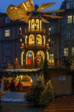 Christmas market with three-story illuminated Christmas pyramid, Rindermarkt, Munich, Upper