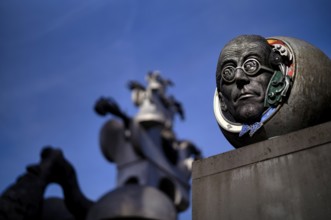 Head, sculpture in front of Villa Visconti, also House of Heads, behind Tower of the Grey Horses by