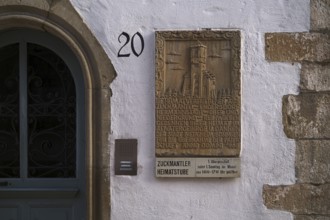 Wall plaque, entrance to Zuckmantler Heimatstube, museum, Bietigheim-Bissingen, Baden-Württemberg,