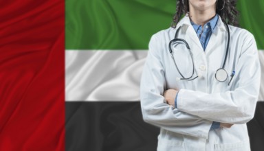 Medical professional on United Arab Emirates flag. Healthcare and wellness in United Arab Emirates,