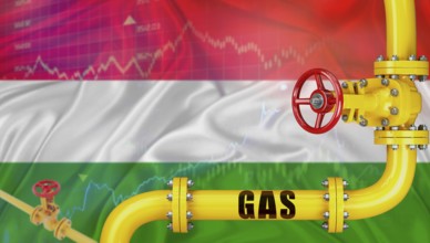 Gas pipeline with the Hungary flag in the background. Gas production with the Hungarian flag on a
