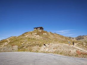 Steinerne Hütte at the Timmelsjoch rest house on the border between Austria and Italy, above
