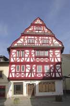 Red frame house Thaynsches Haus built 16th century with tail gable, red, Meisenheim,