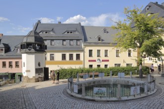 Historic bell tower with carillon and ornamental fountain, turrets, houses, Schwarzenberg, Western