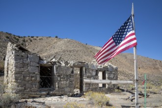 Austin, Nevada - A flag flies beside the ruins of the Walters station on the Nevada Central
