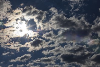Dramatic cloudy sky with sunbeams, Upper Austria, Austria