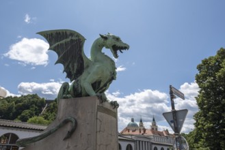 Green dragon statue on Dragon Bridge (Zmajski Most) in Ljubljana, Slovenia