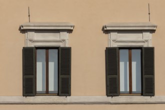 Windows of a building in the city of Rome, Italy