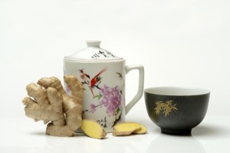 Ginger root with cup, ginger tea