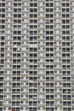 Exterior façade of a residential high-rise building of Condo U (a brand or series name of the Thai