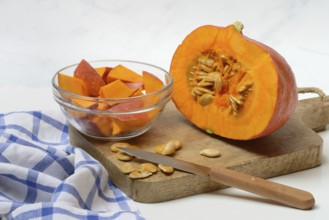Hokkaido pumpkin, sliced with a knife