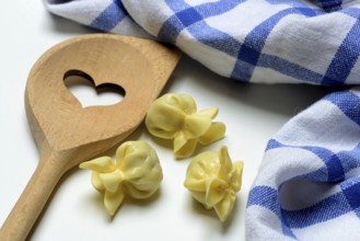 Saccottini, type of Italian pasta and cooking spoon with heart, pasta from Italy