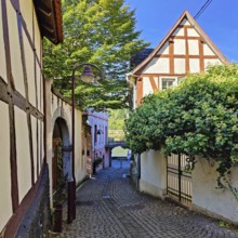 Enge gasse with half-timbered houses in the old town of Unkel, Rotweinstadt, Neuwied district,