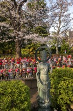 Jizo statues with red crocheted caps, guardian deities for deceased children, Unborn Children