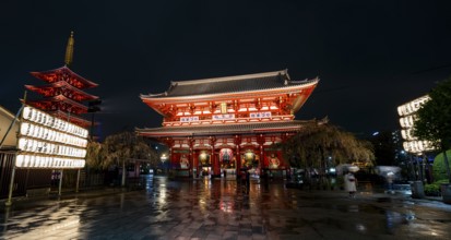 Illuminated five-story pagoda and main hall of Asakusa Shrine or Senso-ji Temple, at night,
