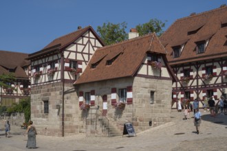 Historic buildings in the castle courtyard, Kaiserburg, Nuremberg Castle, Nuremberg, Middle