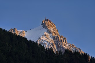 Snowy Aiguille du Midi in the evening light, Mont-Blanc, Chamonix-Mont-Blanc, Haute-Savoie, France