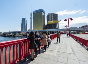 Visitors on the Azuma Bridge, Sumida City Skyline, Sumida City Office, Tokyo Skytree, Asahi Beer