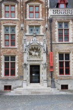 Gruuthusemuseum with equestrian statue of Lodewijk van Gruuthuse above the entrance portal in the