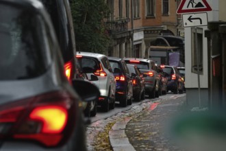 Cars stuck in traffic, autumn time, Germany