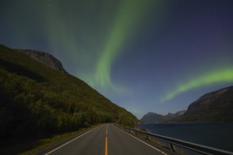 National mountain of Norway - Stetind in the Nordland under auroras and a full moon