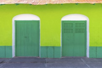 Colorful colonial architecture of historic center of Flores, Guatemala