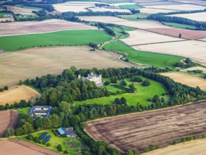 Wedderburn Castle and Barns over fields from a drone, Duns, Berwickshire, Scotland, UK