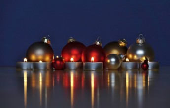 Still life with Christmas tree balls and candles, Germany