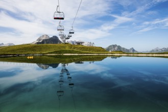 Mountain landscape with reservoir and chairlift, Saloberkopf, Warth, Bregenzerwald, Vorarlberg,