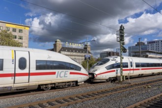 ICE train on track 2 in Essen main station, view of the city center, Handelshof building with Essen