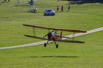 A Stampe-Vertongen SV-4A double-decker registered with HB-UPR during a flight demonstration as part