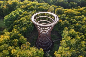 Aerial view over 45-meter-tall hyperboloid observation tower in forest near Gisselfeld monastery at