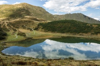 Schlappoldkopf and Söllerkopf are reflected in Schlappoldsee, Fellhorn, Oberstdorf, Oberallgäu,