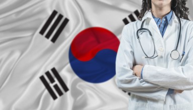 Medical professional on South Korea flag. Healthcare and wellness in South Korea, Concept