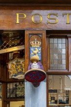 The Posthumus Shop, stationery boutique, shop façade with decorative stamp motifs, St. Luciensteeg,