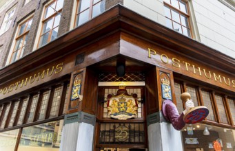 The Posthumus Shop, stationery boutique, shop façade with decorative stamp motifs, St. Luciensteeg,