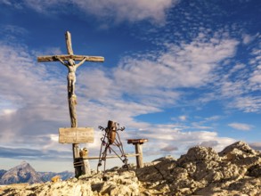 Summit cross and sculpture on the small Lagazuoi, Dolomites, Alps, Belluno province, Veneto region,