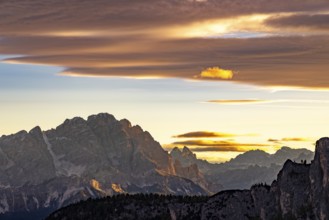 Sunrise over the Dolomites, coloured clouds above, Dolomites, Alps, Belluno province, Veneto