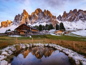 Geisleralm with Geisler Group in Alpenglühen, reflection, Dolomites, Santa Magdalena, Trentino,