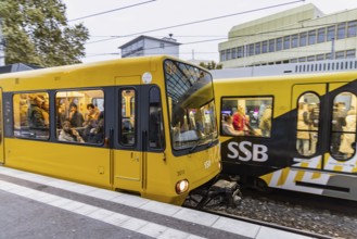 Wilhelmsplatz Bad Cannstatt stop, Stuttgarter Strassenbahnen AG, SSB. Platform with passengers.