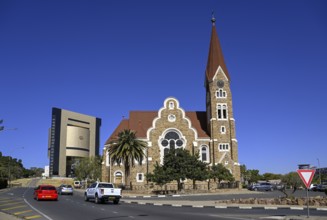 Evangelical Lutheran Christ Church from 1910, in the background the Independence Museum, Windhoek,