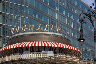 Café Kranzler with historic lantern and modern office building on Kurfürstendamm, Charlottenburg,