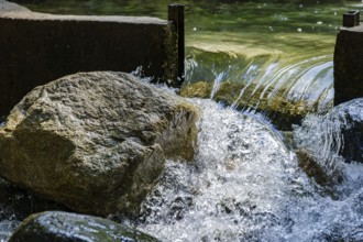 Water flows through an open dam, Horlachbach below the Stuiben Falls near Umhausen in Ötztal,