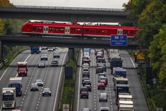 Local train crossing the A3 motorway between the Hilden junction and the Mettmann junction, view to