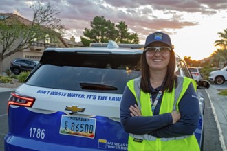 Las Vegas, Nevada - Devyn Choltko, a water waste investigator, patrols a residential neighborhood