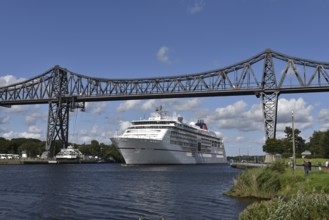 Cruise ship EUROPA 2 passes the Rendsburg transporter bridge in the Kiel Canal, NOK, Kiel Canal,